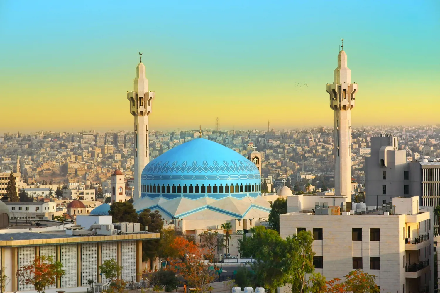 King Abdullah I Mosque and the Amman skyline in Jordan