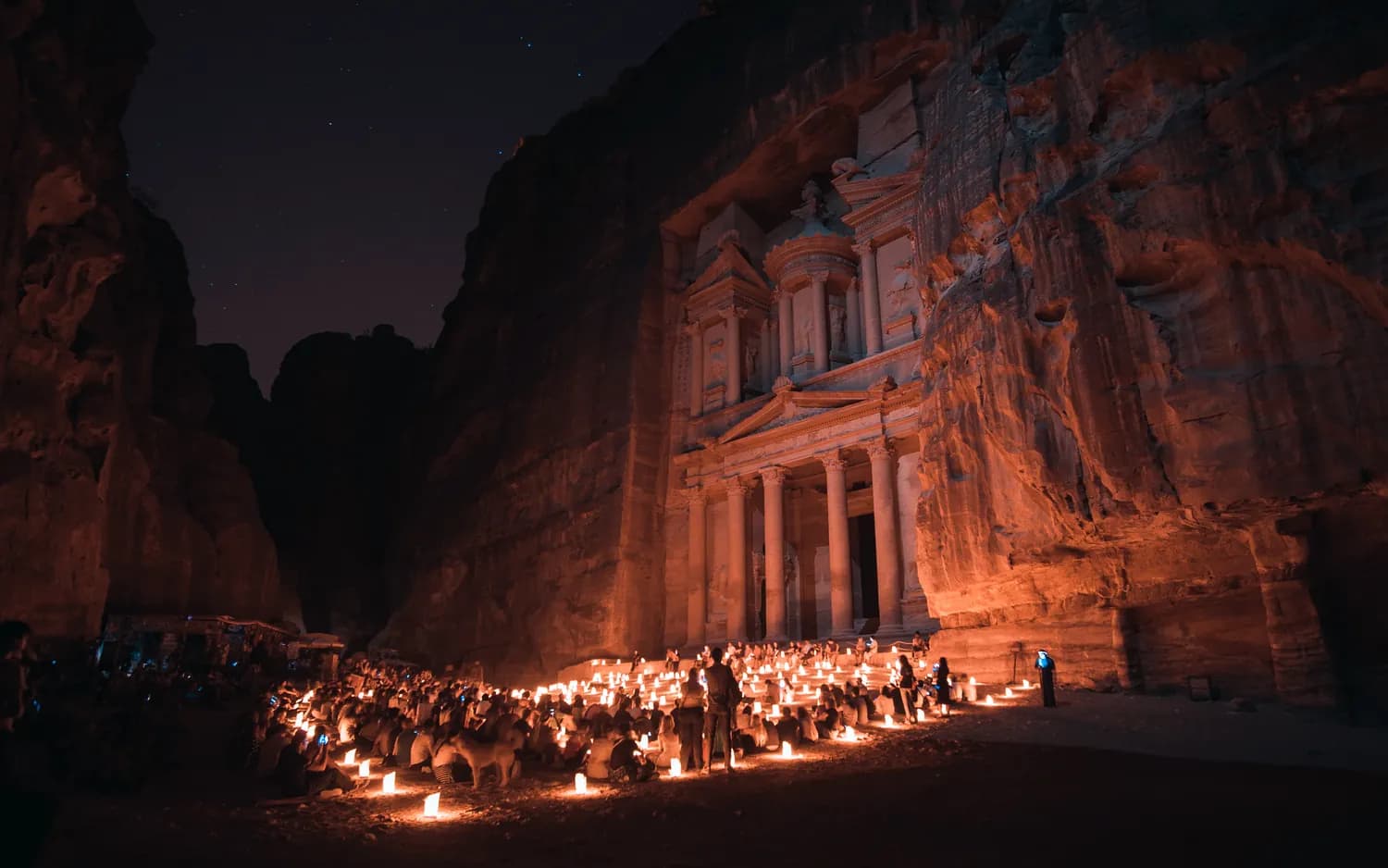 The Treasury illuminated by candles during Petra by Night in Jordan