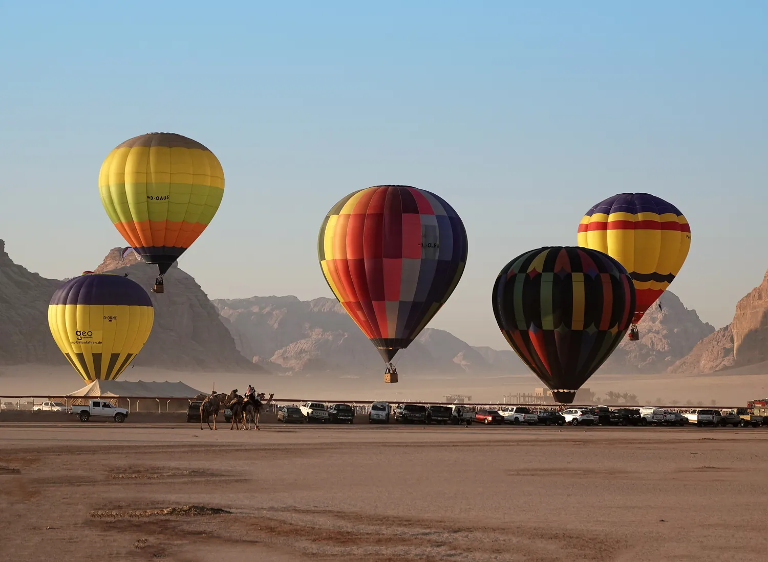 Hot-air balloons over the desert landscape of Wadi Rum, Jordan